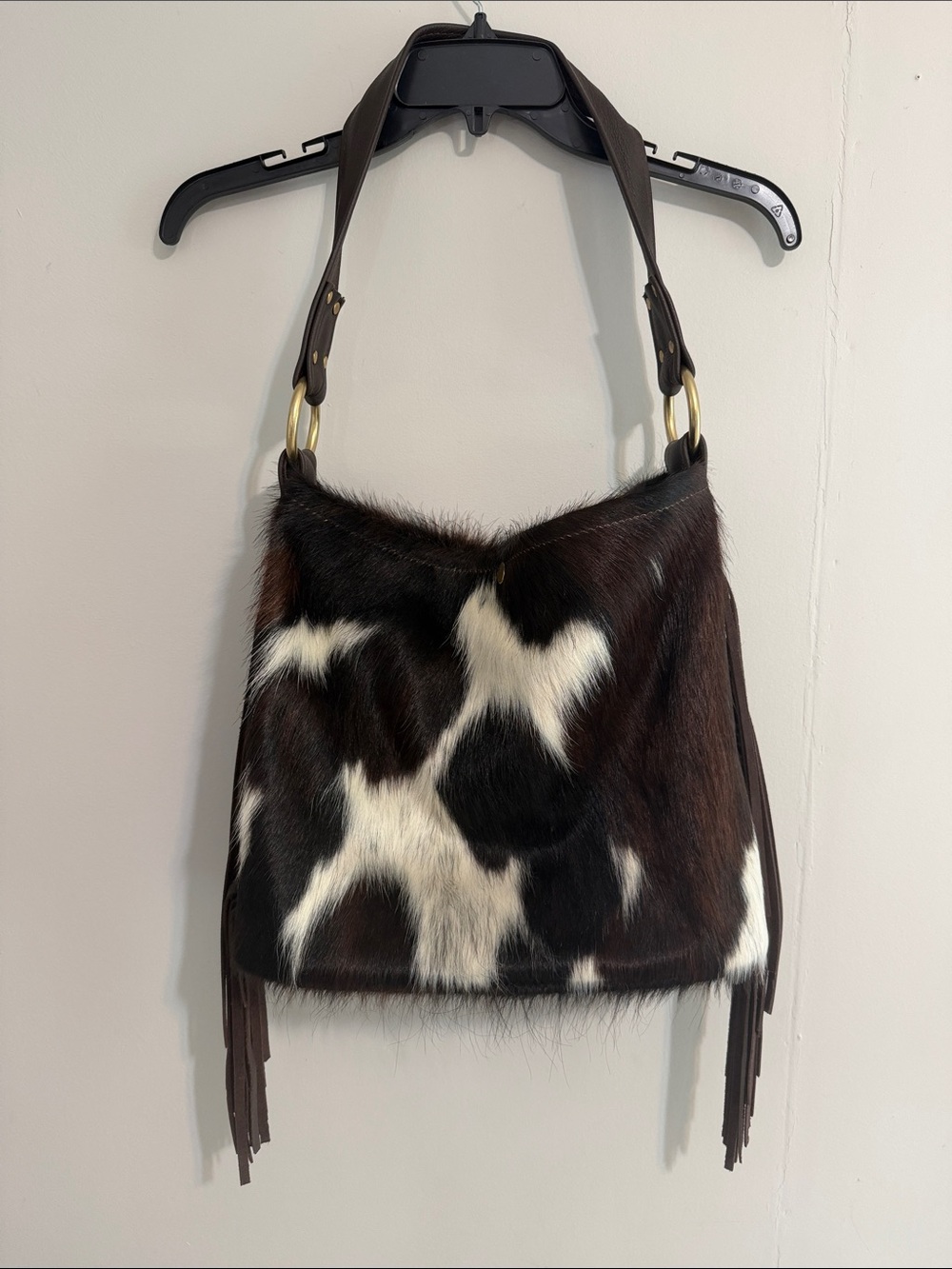 Custom made faux cowhide shoulder bag.